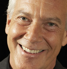 older man in black shirt